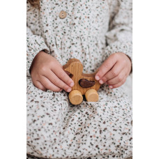 Деревянная игрушка каталка 