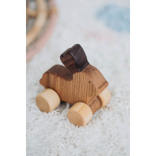 Деревянная игрушка каталка 